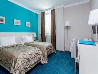 Отель Aqua-Minsk Hotel Минск Двухместный номер с 2 отдельными кроватями-1